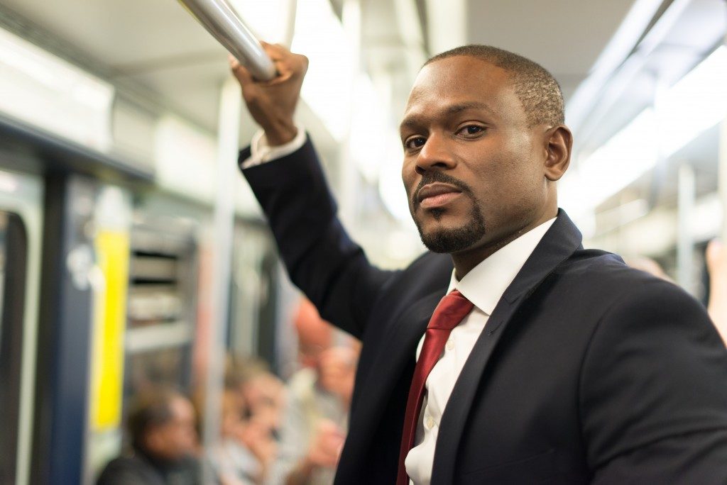 man on a train to work