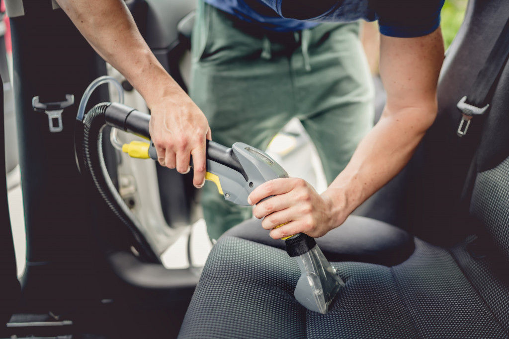 vacuuming car seat