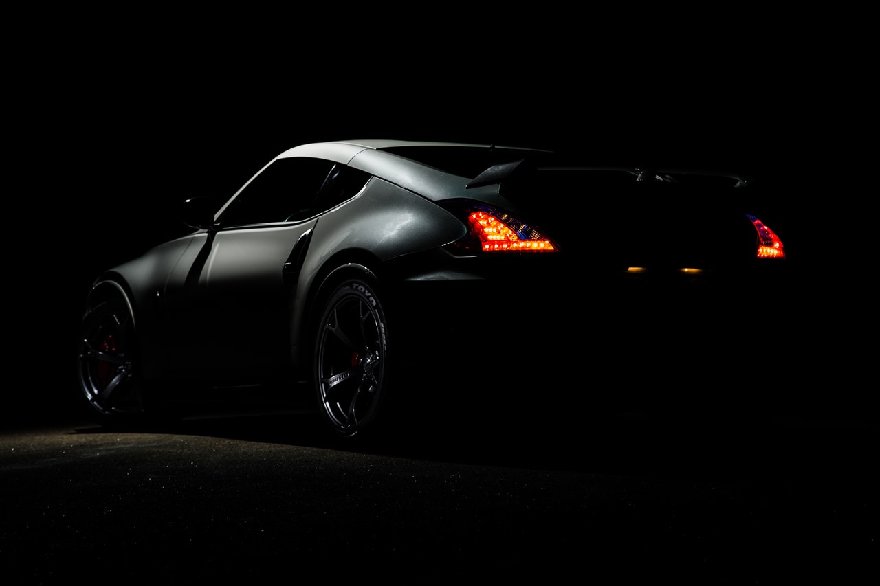 a black car on a dark street