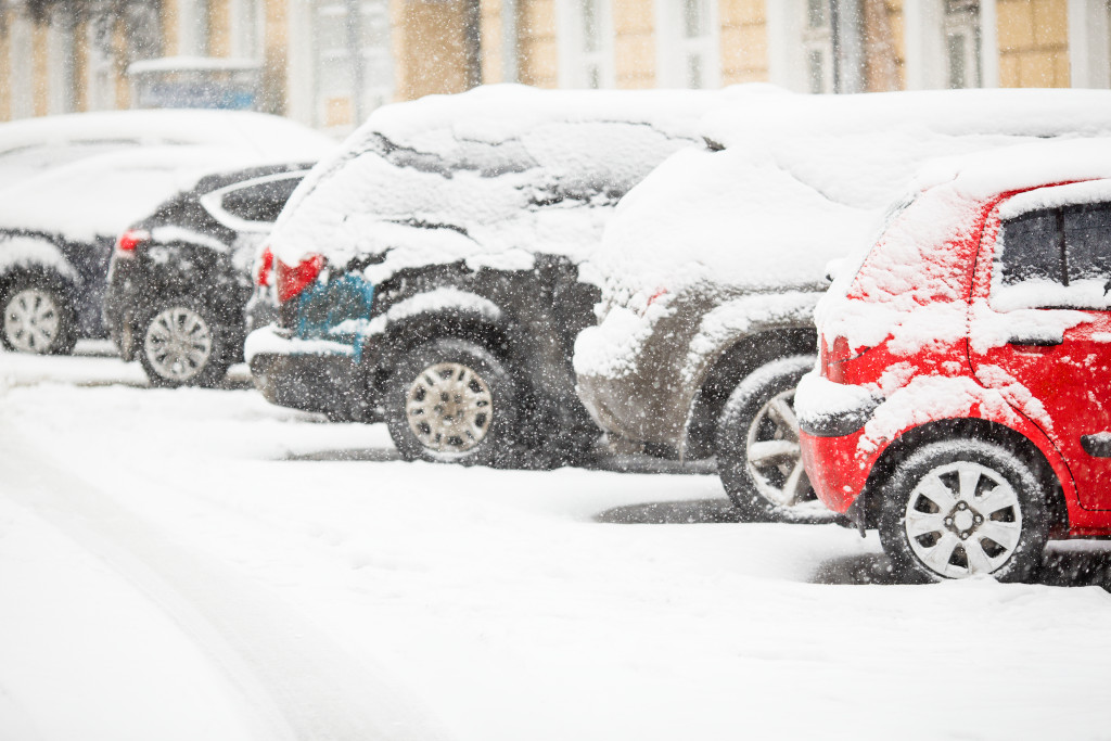 snow covered cars