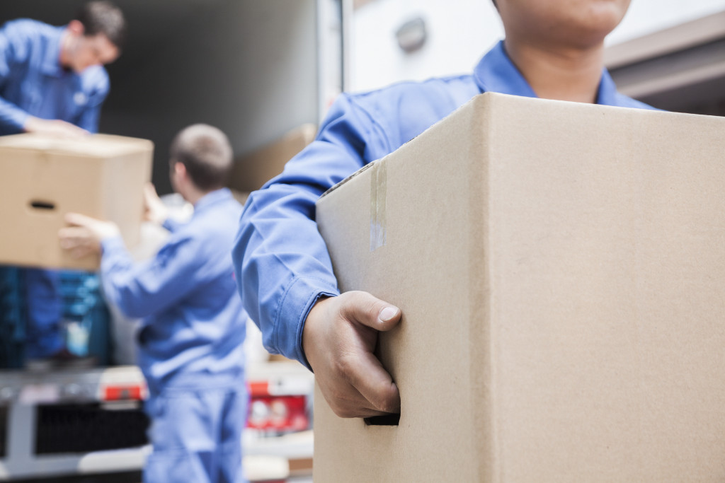 Team unloading boxes from a truck